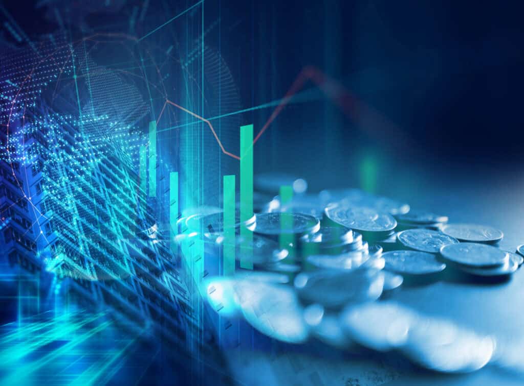A digital composite image showing silver coins, green bar graphs, a red line graph, a modern building, and a digital globe, all overlaid with abstract tech patterns in blue and green hues, symbolizing finance and technology.
