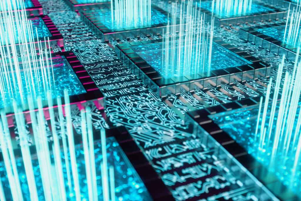 Close-up of a futuristic circuit board with glowing blue components and vertical light beams.