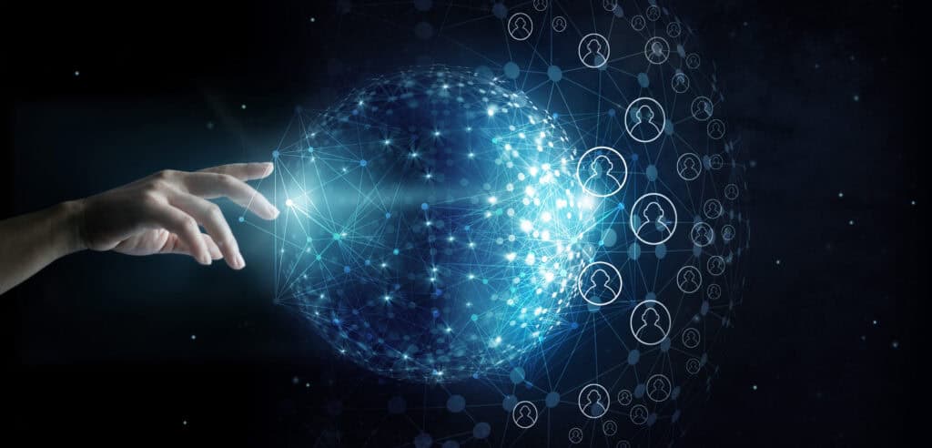 A hand touching a glowing blue digital globe with interconnected lines and user profile icons, against a dark, starry background.