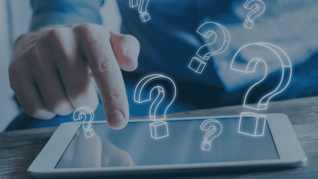 A hand touches a tablet screen, surrounded by glowing question mark icons.