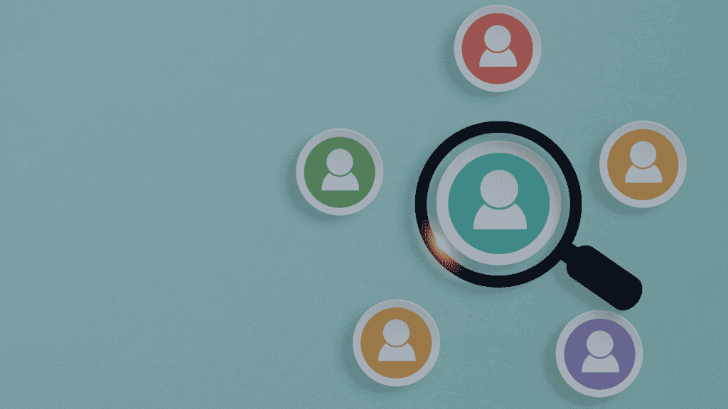 A magnifying glass highlights a teal person icon, surrounded by five other colorful person icons on a blue background.