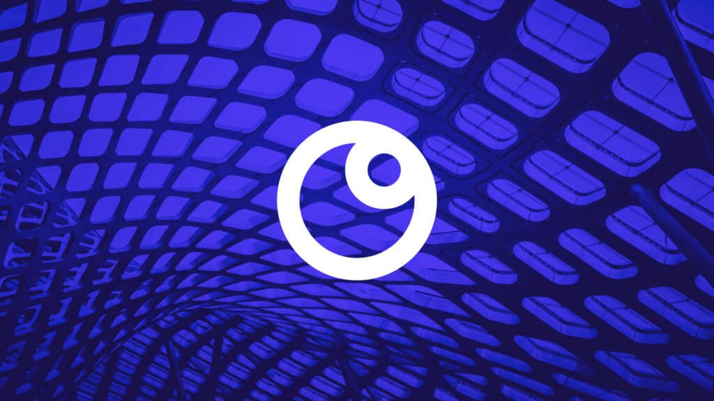 A white circular logo with a smaller inner circle, centered on a dark blue background featuring a grid-like architectural pattern with rounded rectangular openings.