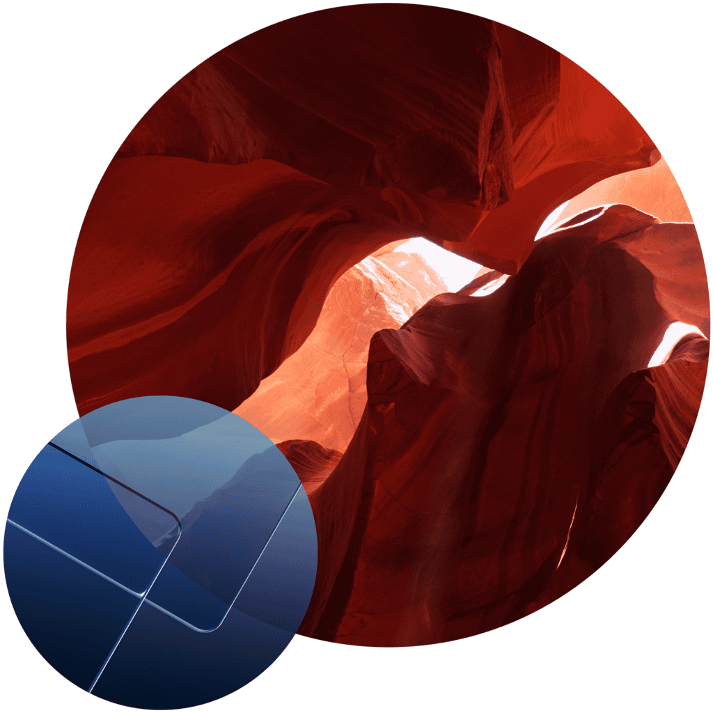 A slot canyon with wavy, reddish-orange walls illuminated by bright light, partially overlaid by a smaller, semi-transparent blue circle with abstract geometric shapes, all against a black background.